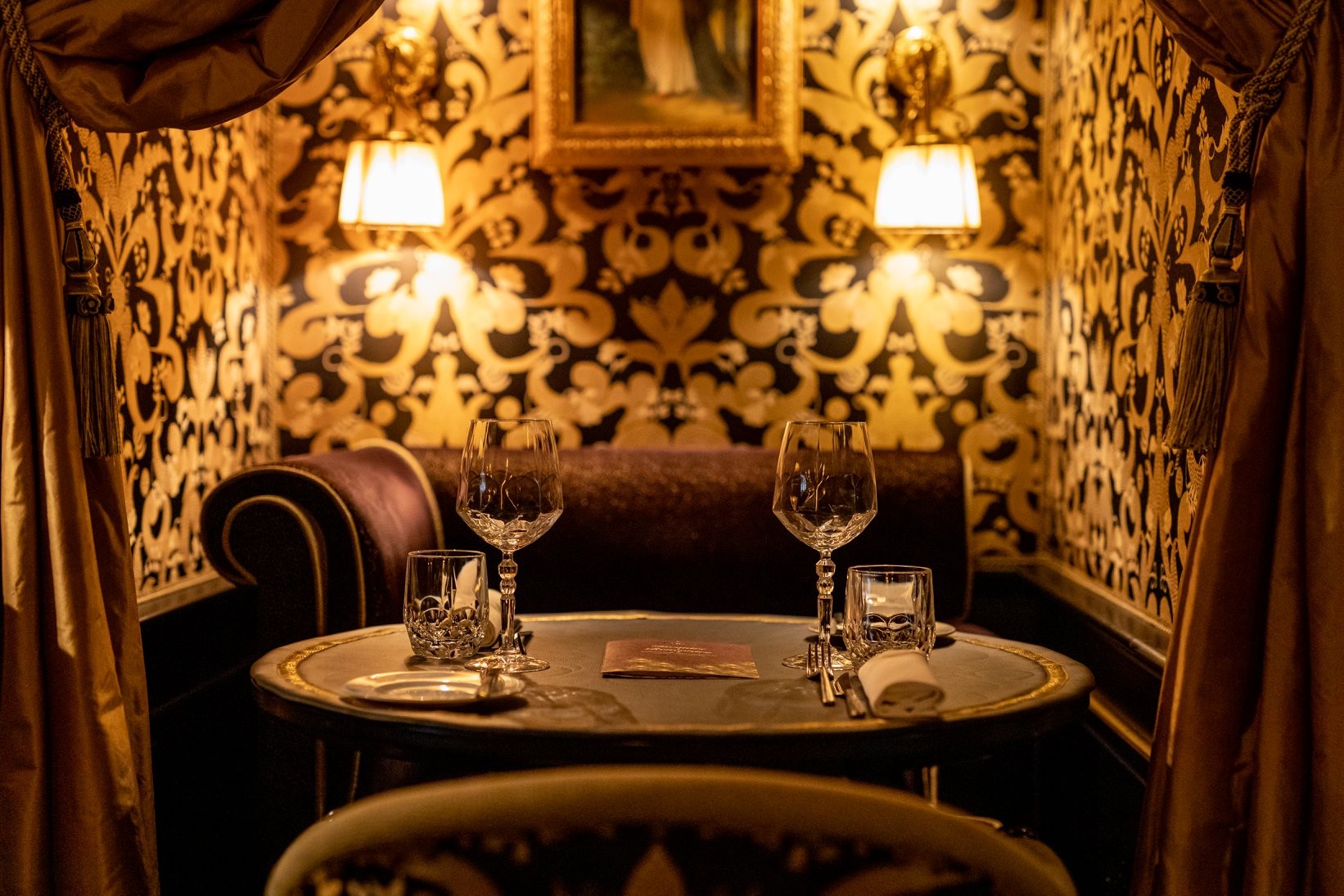 Intimate table in the black and gold Boudoir at Casa Coppelle