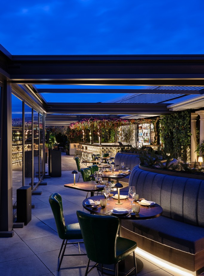 Covered rooftop dining area at SEEN by Olivier Rome