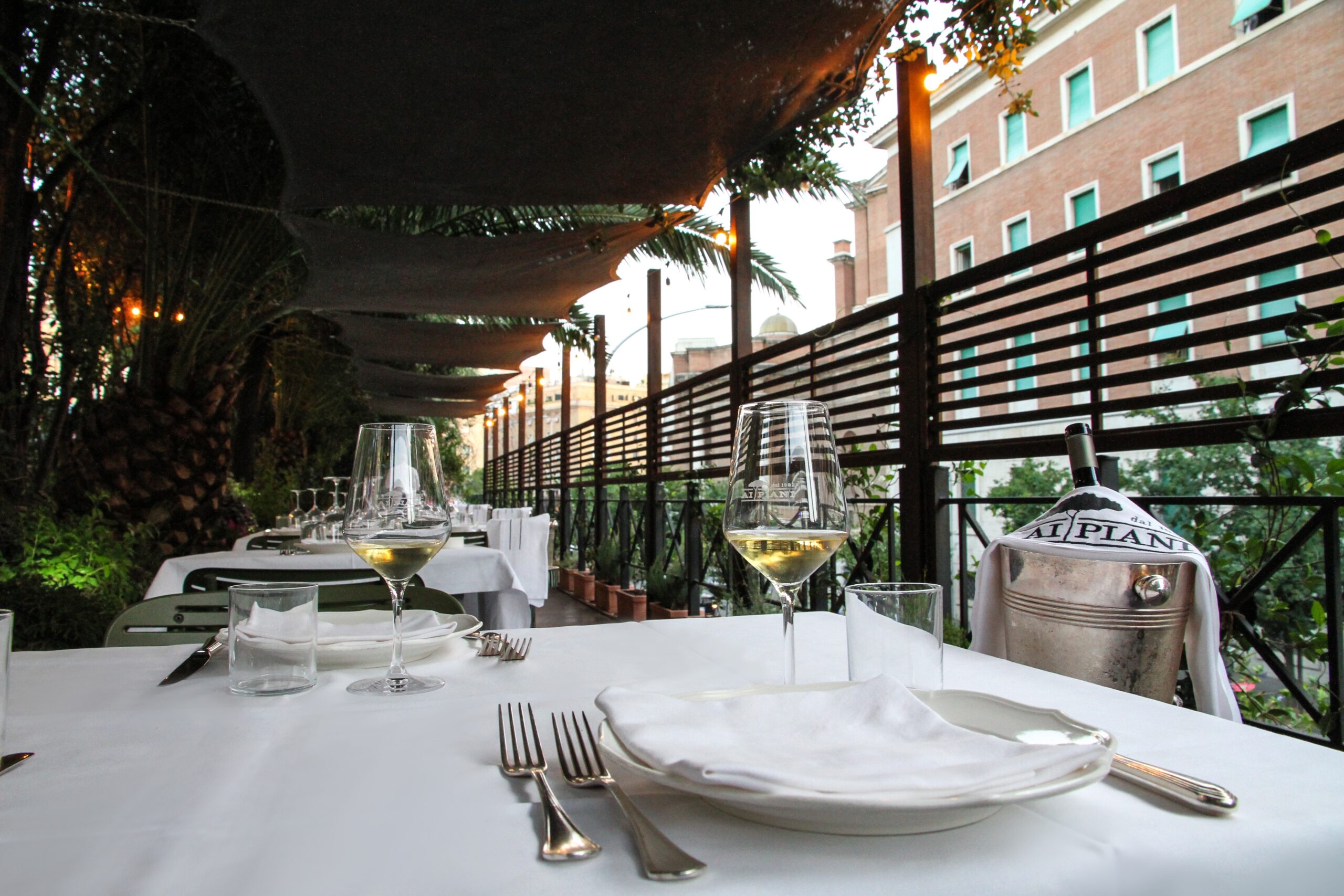 Garden dining area at Ai Piani
